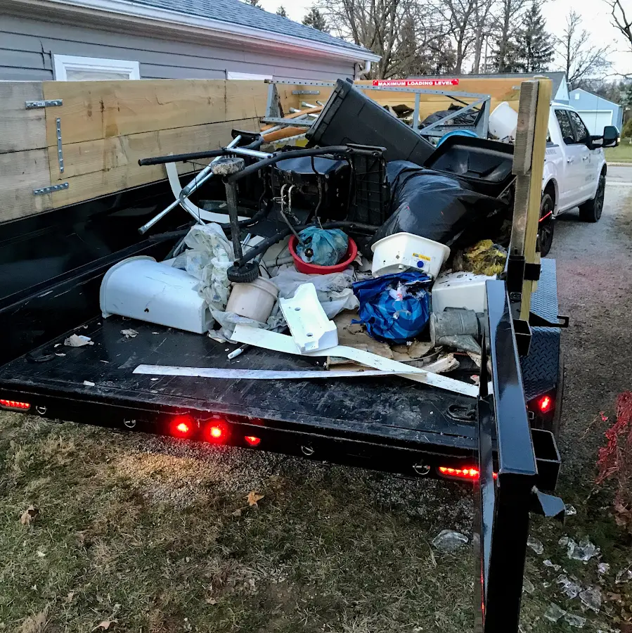 Roll-off dumpster delivered to a residential driveway in Carroll