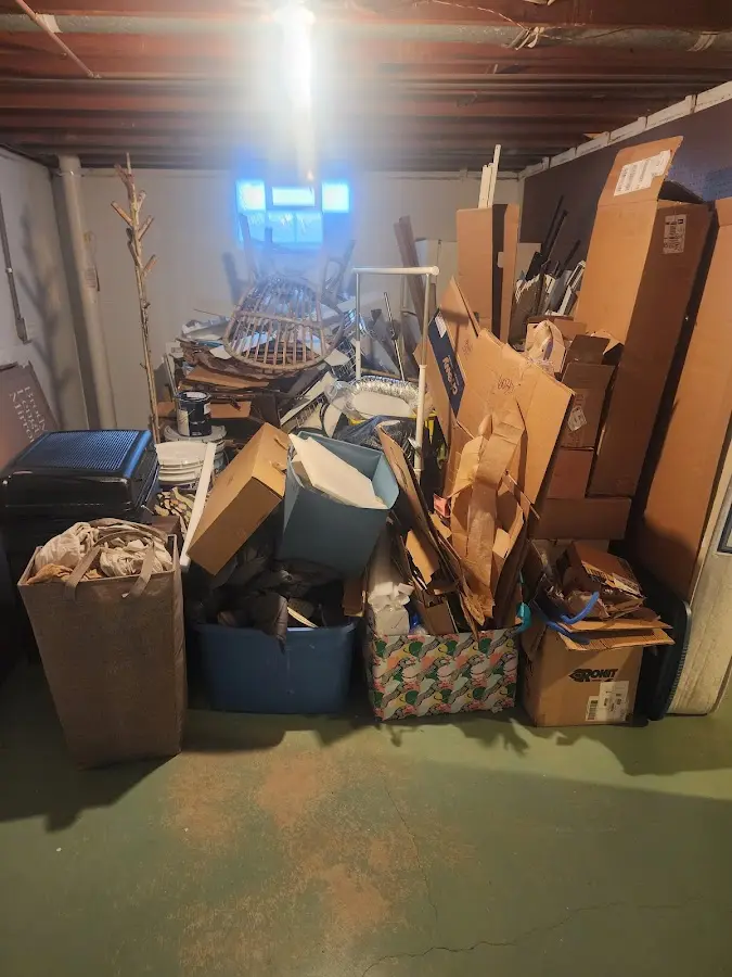 Roll-off dumpster container at job site for 4 Yard Dumpster Rental in Carroll